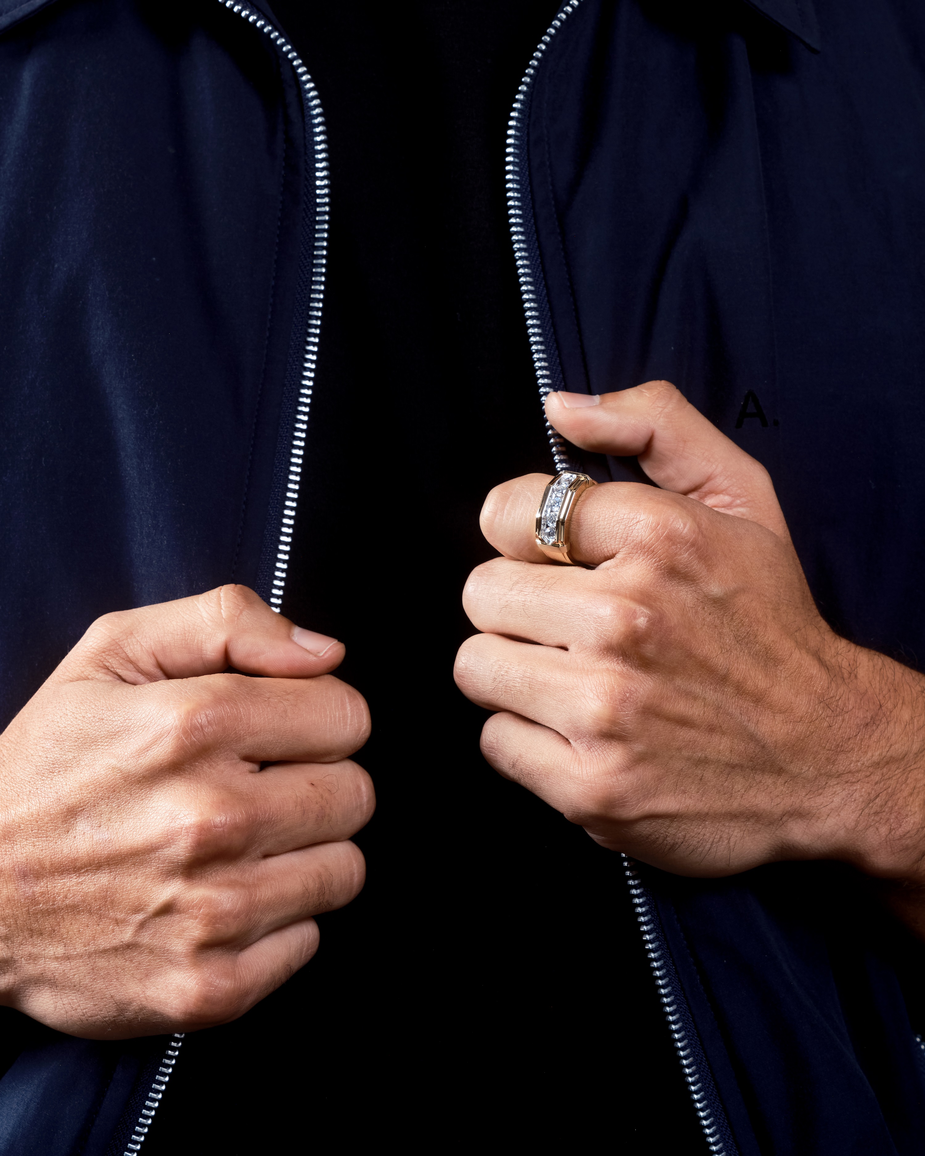 man showcasing Don Roberto Jeweler's ring